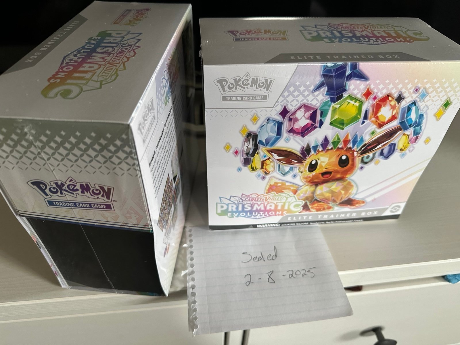 Elite Trainer Box PRISMATIC EVOLUTIONS Pokémon Card