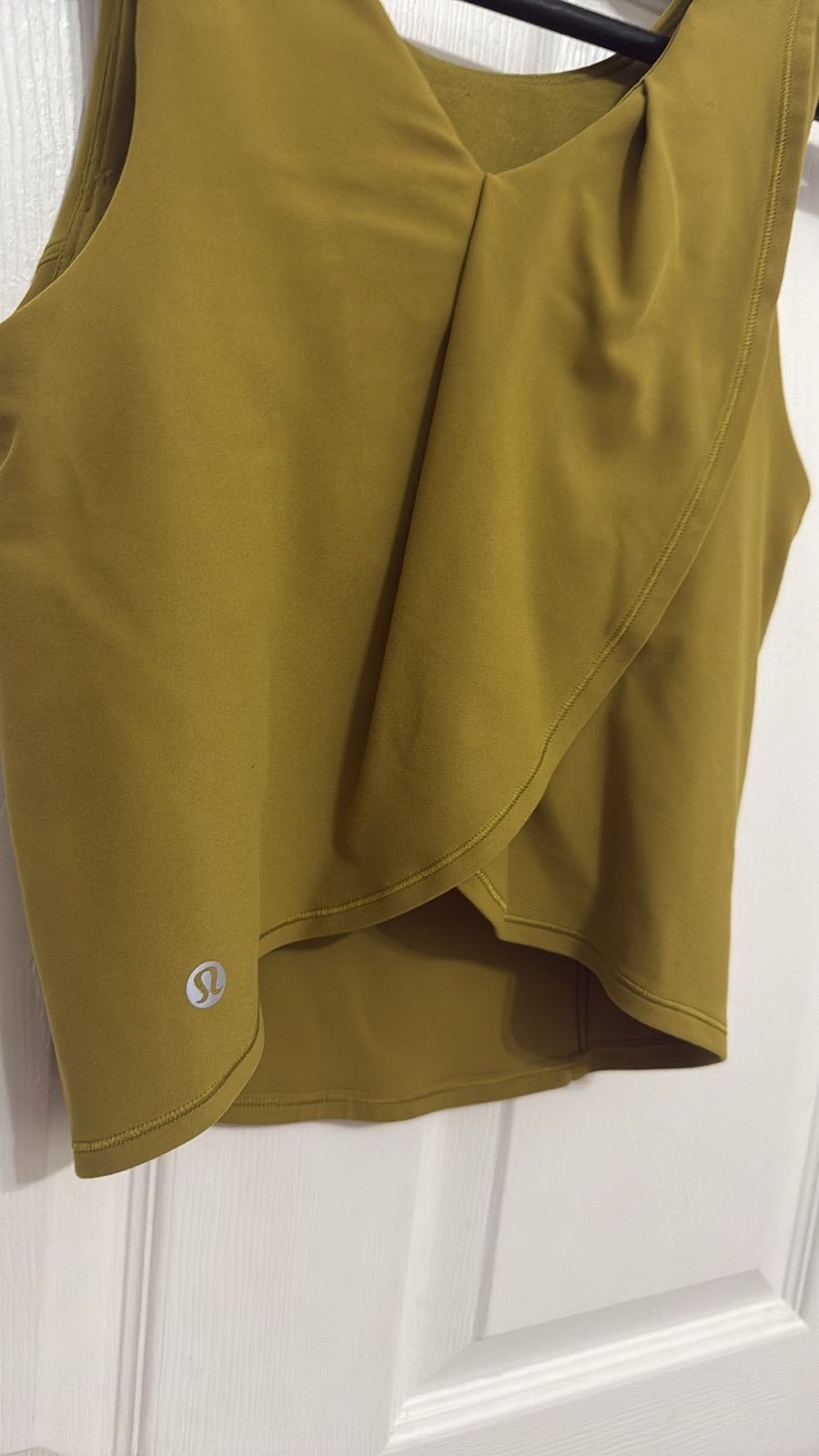 Lululemon women's Twist Back Nulu Tank in auric gold