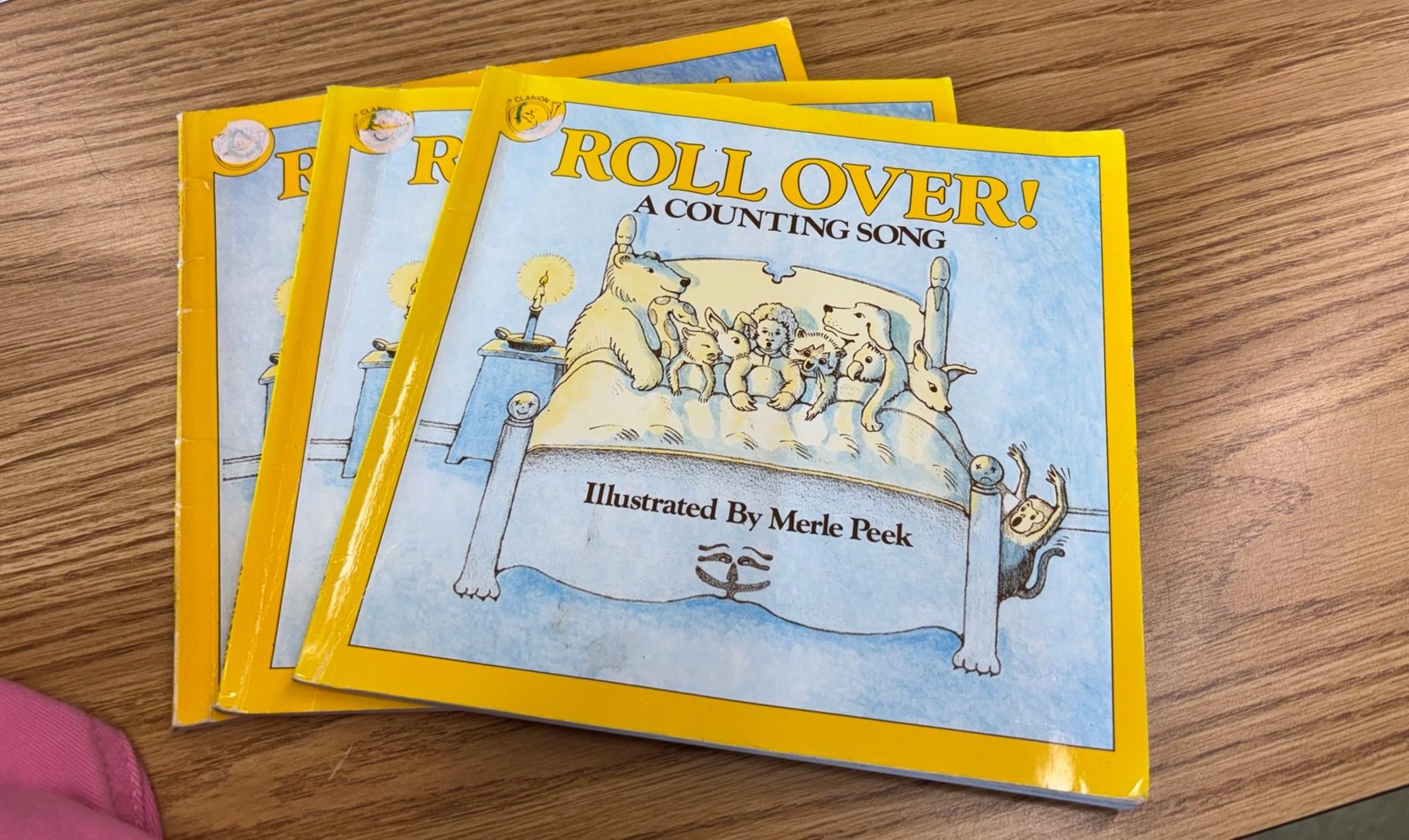 Books “Roll Over A Counting Book” illustrated by Merle Peek