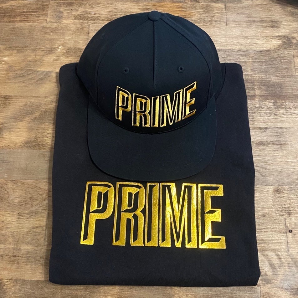 PRIME Drink NYC Gold bottle Event shirt and hat 1 Billion Logan Paul