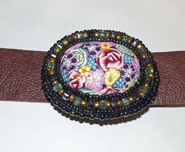 FLOWERED BELT BUCKLE