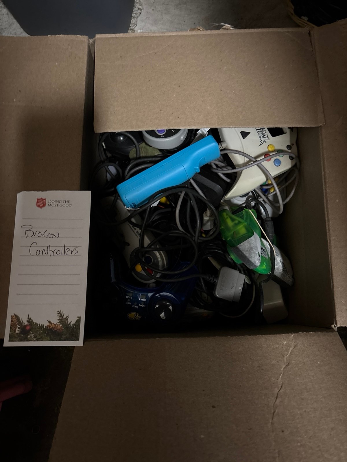 Huge box of misc video game controllers for parts/repair. Wii, SNES, PS2, SEGA