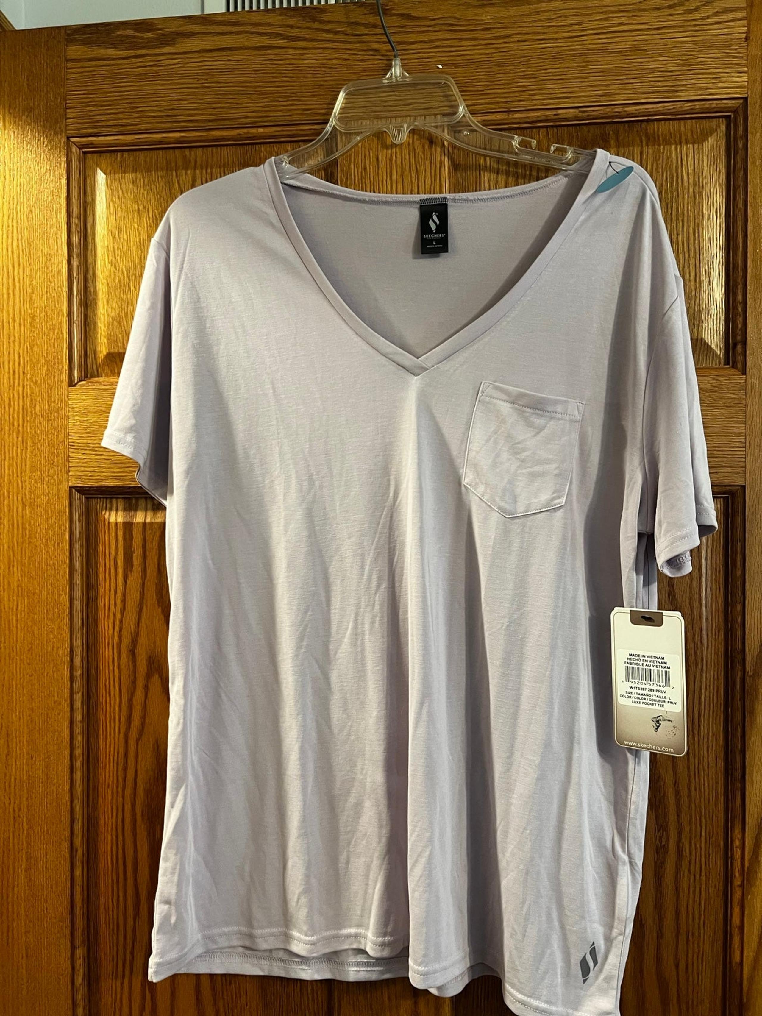 Sketchers woman’s v neck t shirt