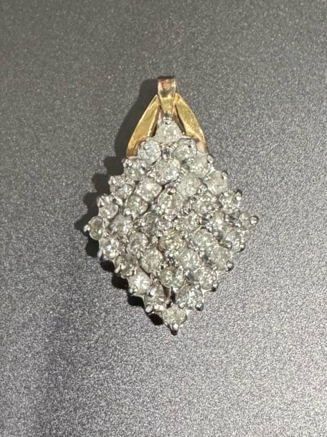 14k yellow gold pendant with 36 diamonds