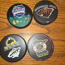 Lot of 4 Minnesota Wild Hockey pucks