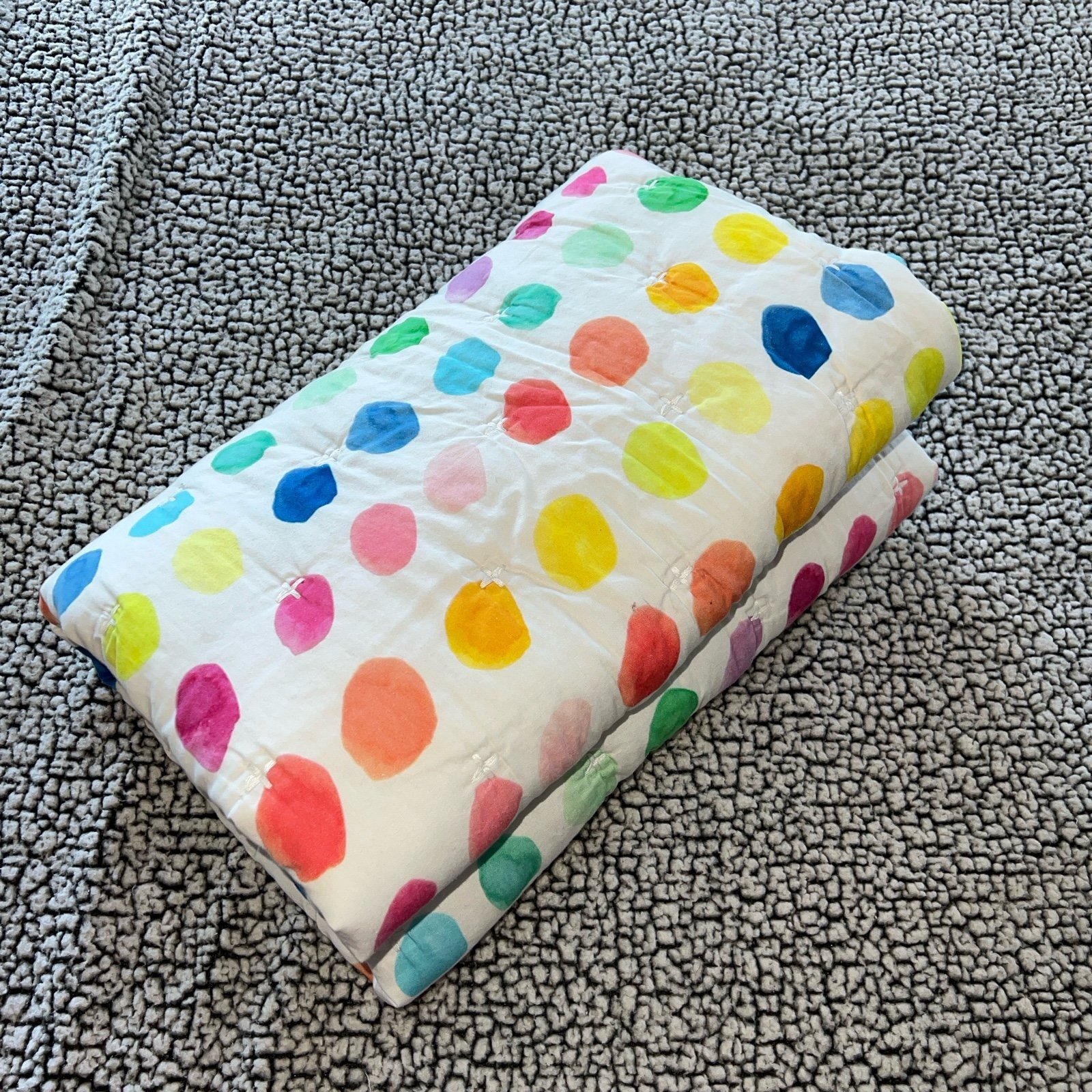 Lovevery rainbow dot organic cotton quilt
