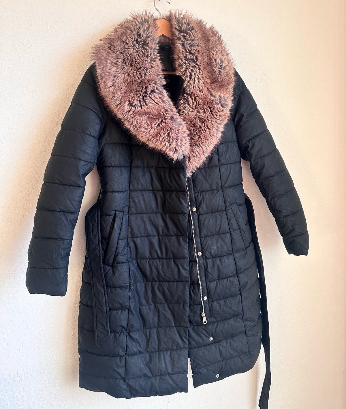 Long puffer coat with faux hair. New no tags.