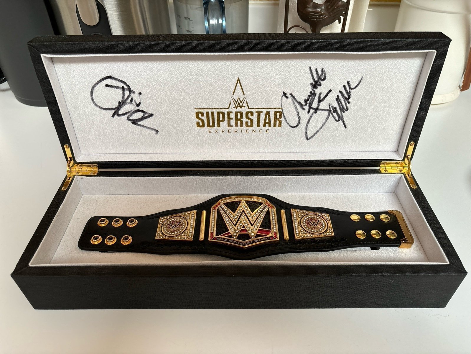 VIP EXPERIENCE MINI WWE REPLICA TITLE SIGNED BY CHARLOTTE, OTIS, CHAD GABLE.