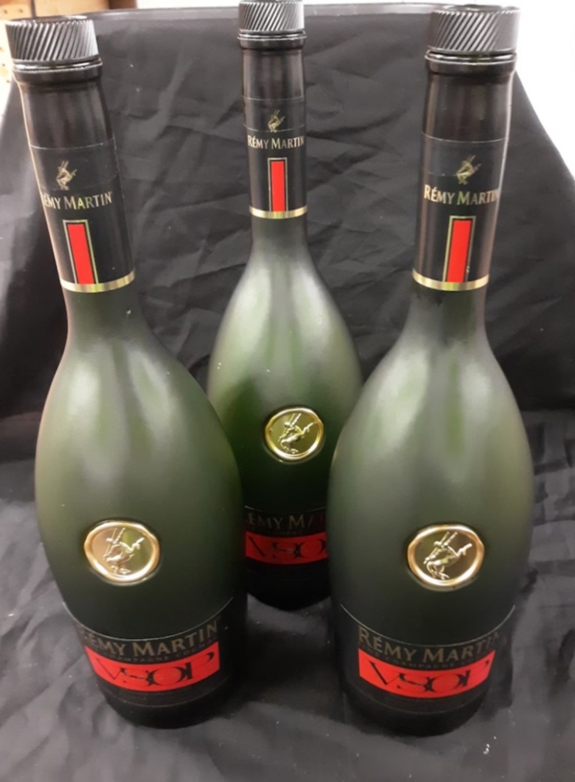 12 empty remy vsop bottles