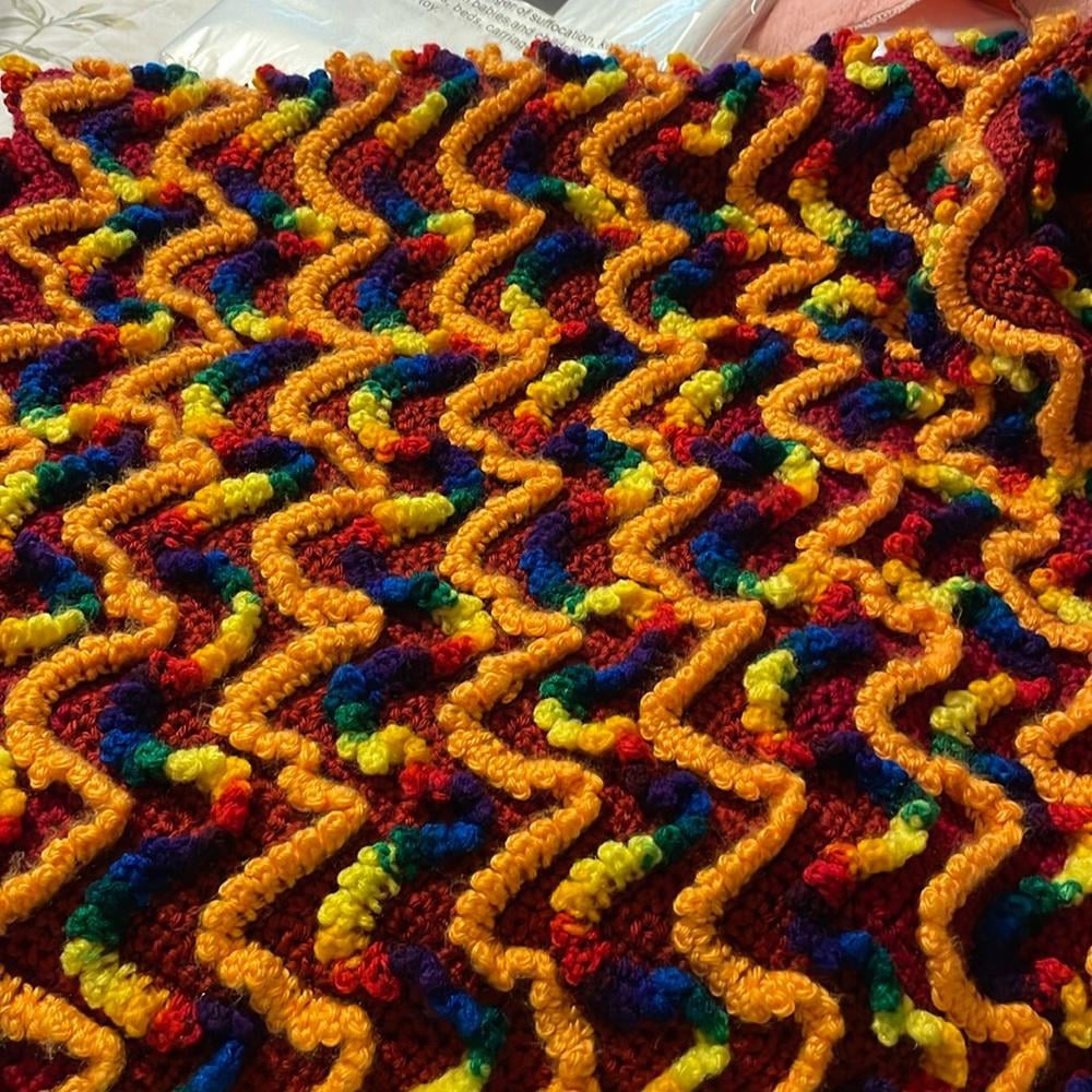 42 X 86 Crocheted Handmade Throw. Colors are amazing along with design.