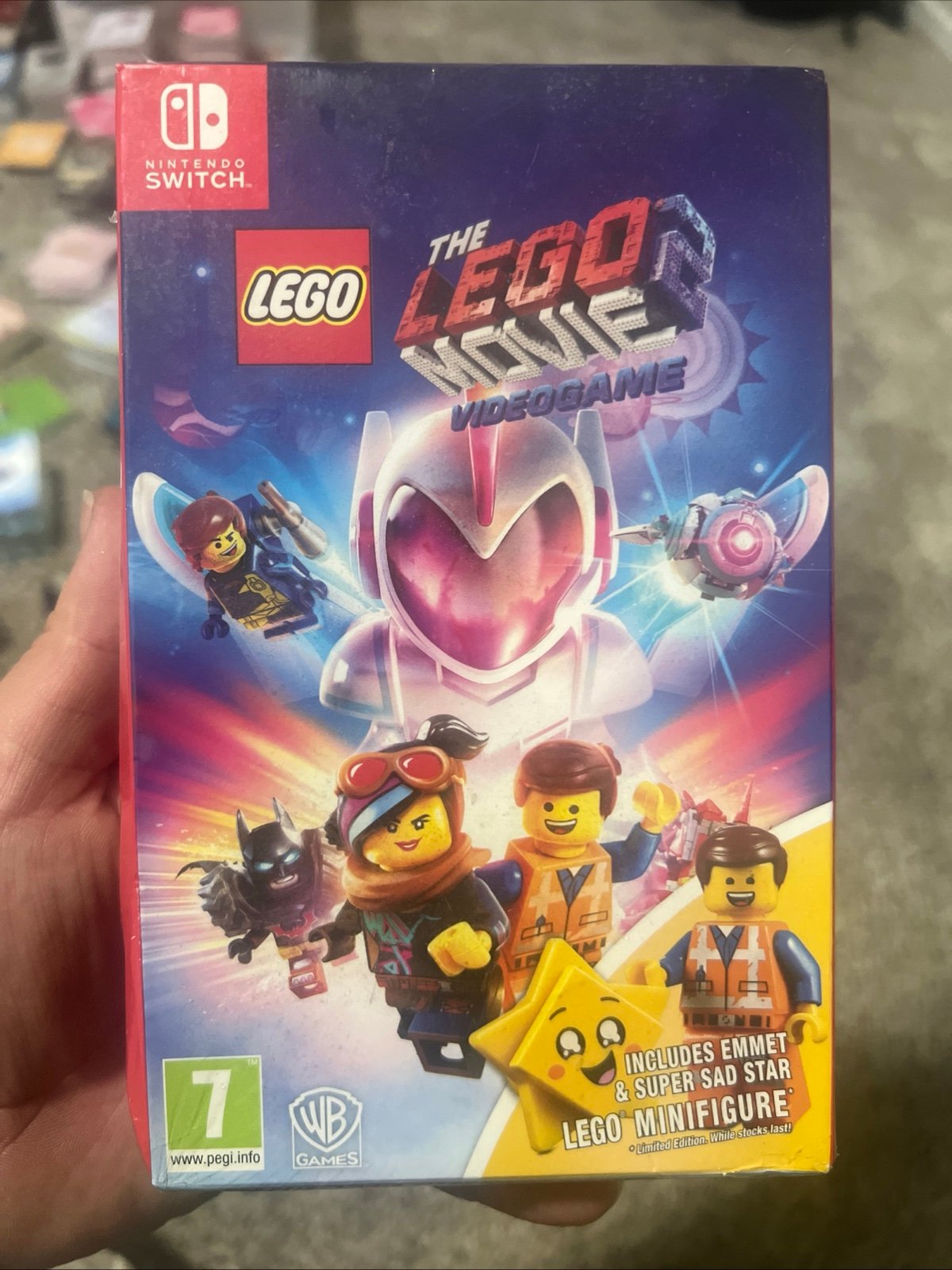 The LEGO Movie 2 Videogame Nintendo Switch w/ Minifigure Emmet & Super Sad Star