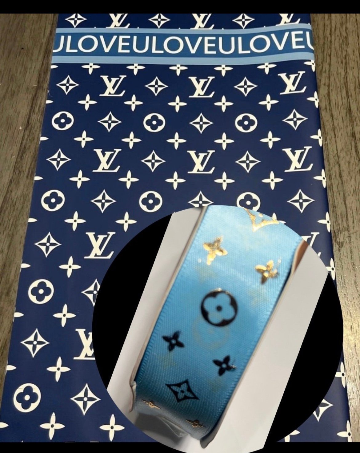 10 packs of 20 sheets of paper per pack and 5 yards of ribbon per pack