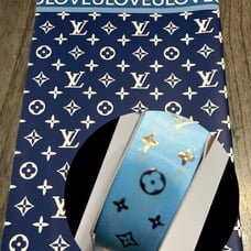 10 packs of 20 sheets of paper per pack and 5 yards of ribbon per pack