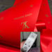 10 packs of 20 sheets of paper per pack and 5 yards of ribbon per pack