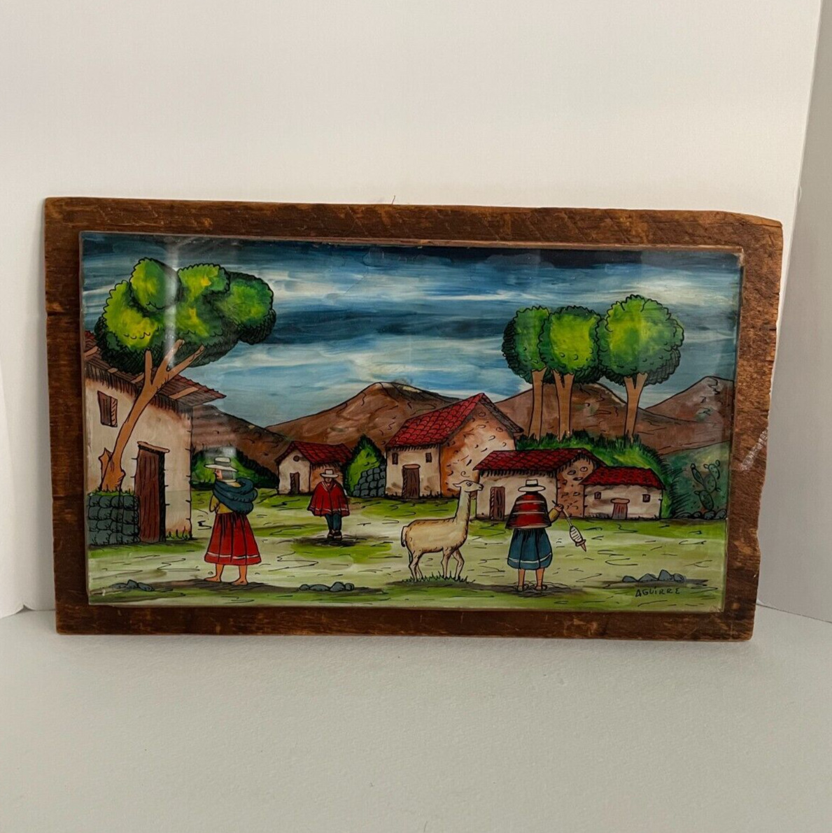 Reverse Painted Glass Folk Art Peruvian Village on Wood 7 1/2 x 12 1/4 Guirre