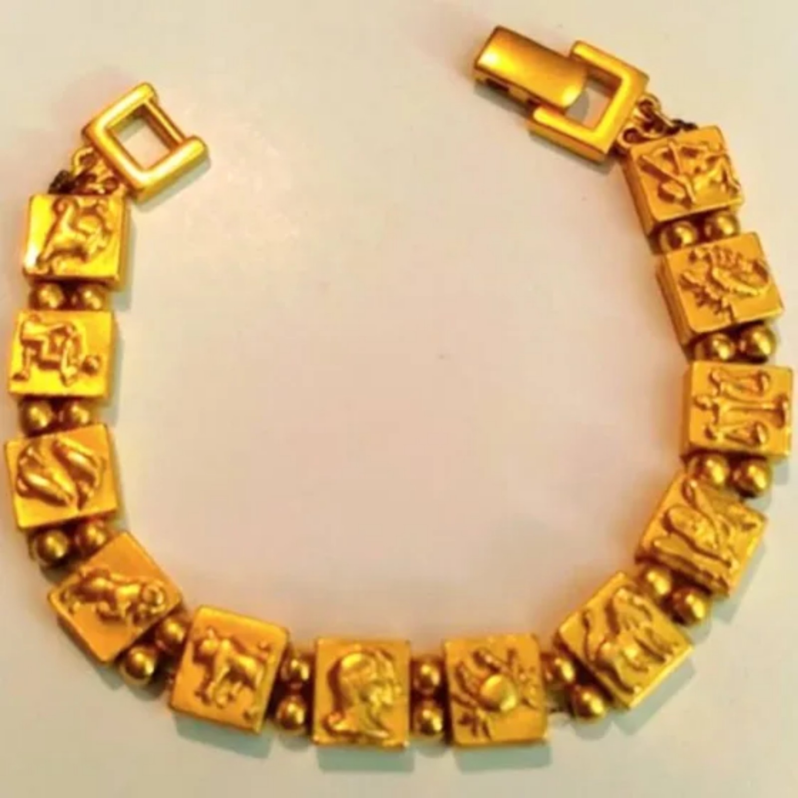 Monet yellow gold horoscope vintage bracelet no flaws or damages
