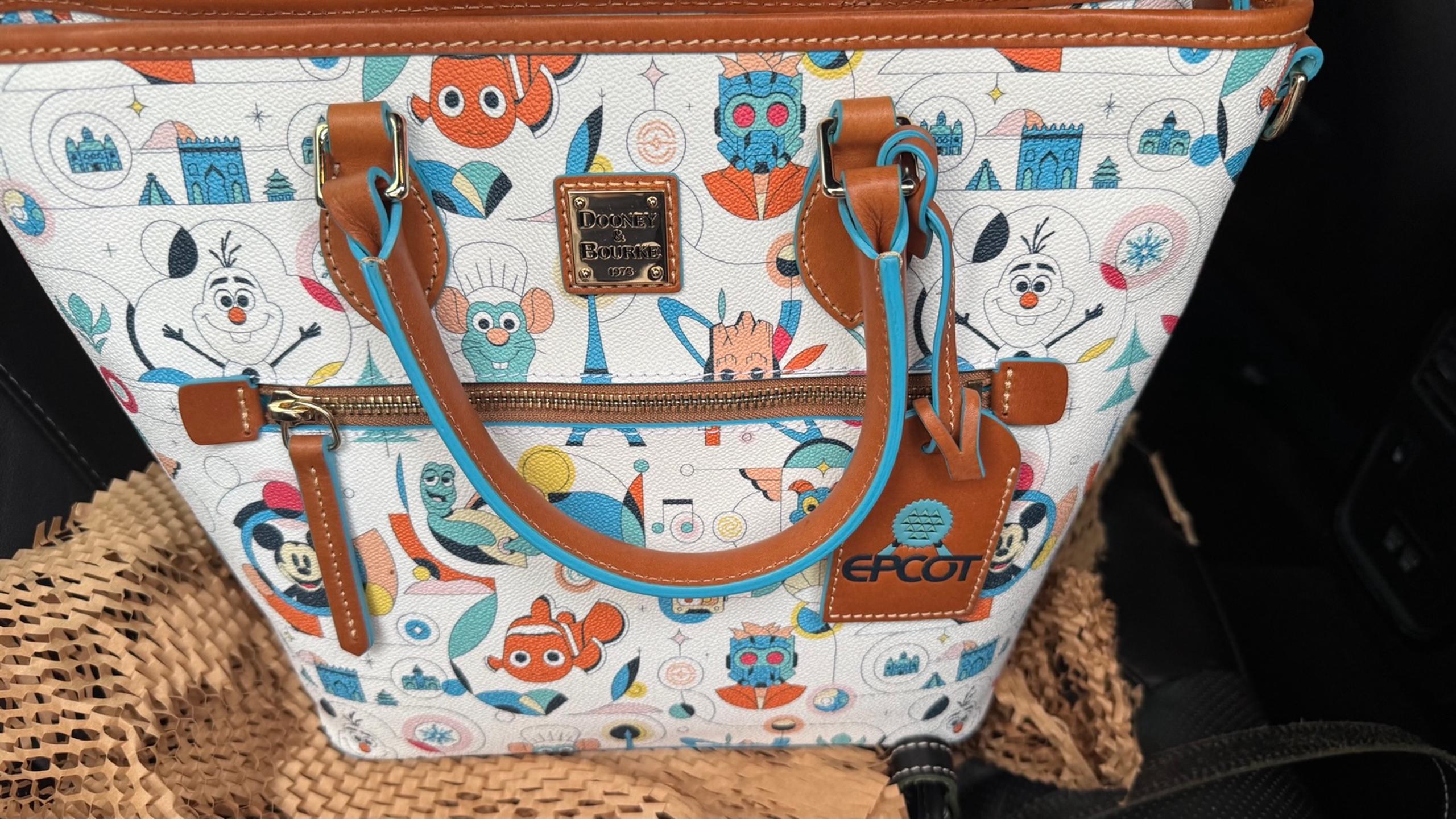 2023 Disney Parks Dooney & Bourke Epcot Reimagined
Figment Remy Small Tote Bag