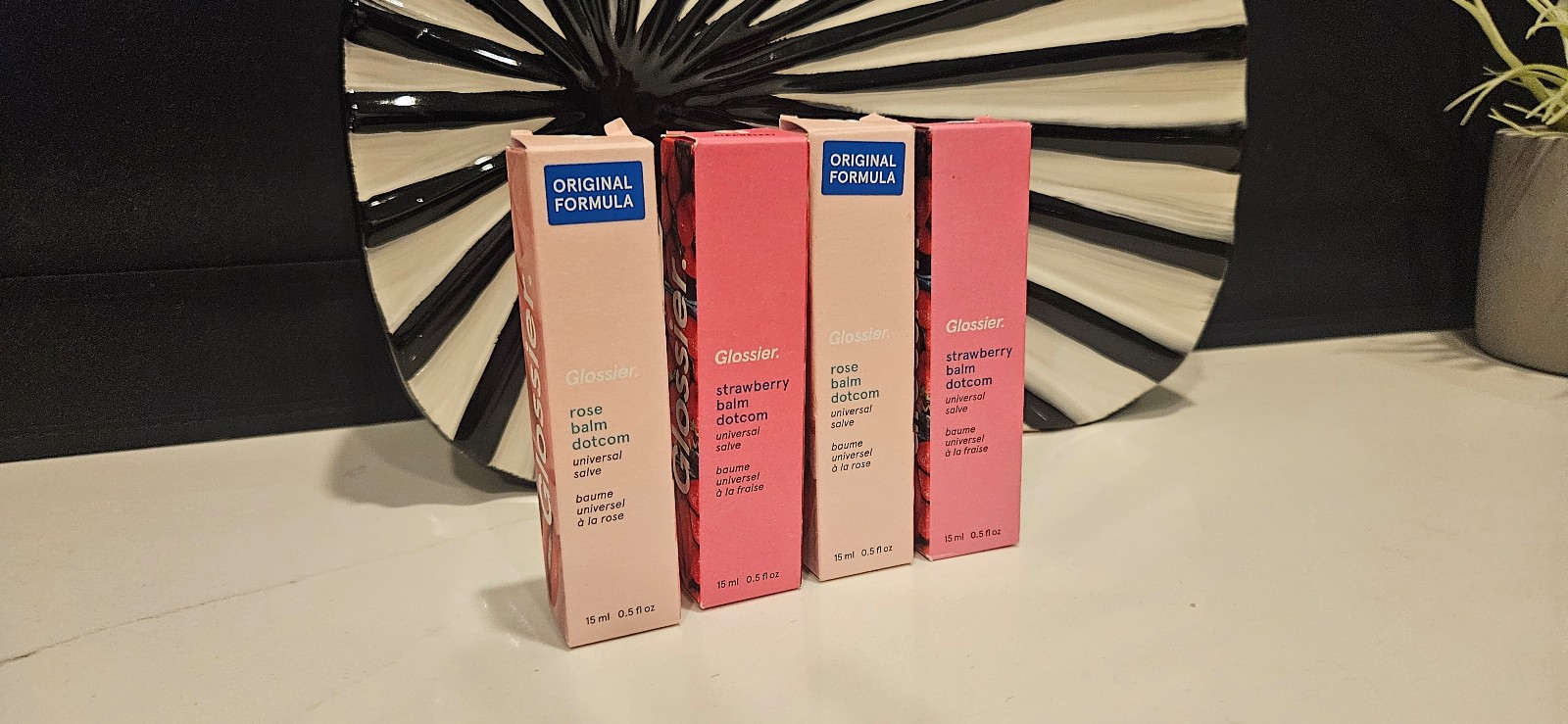 Glossier Balm Dotcom rose pink and strawberry