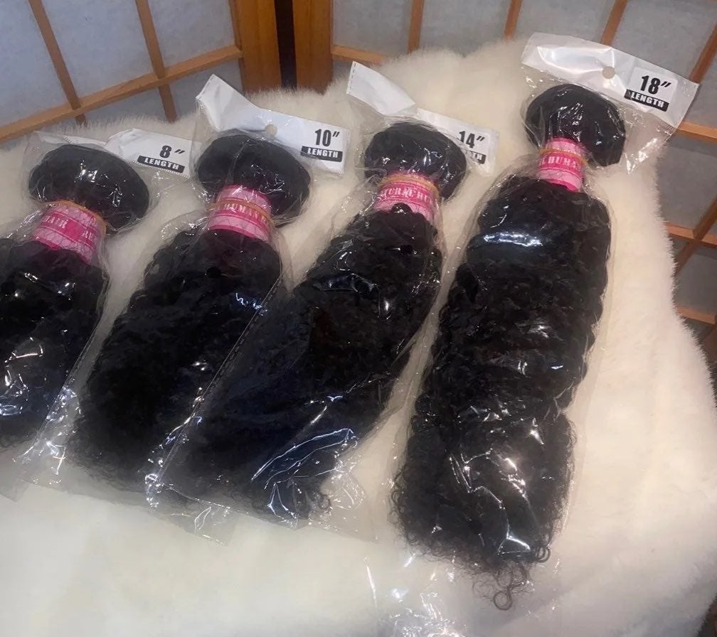 4 NEW BUNDELS OF 100% HUMAN HAIR