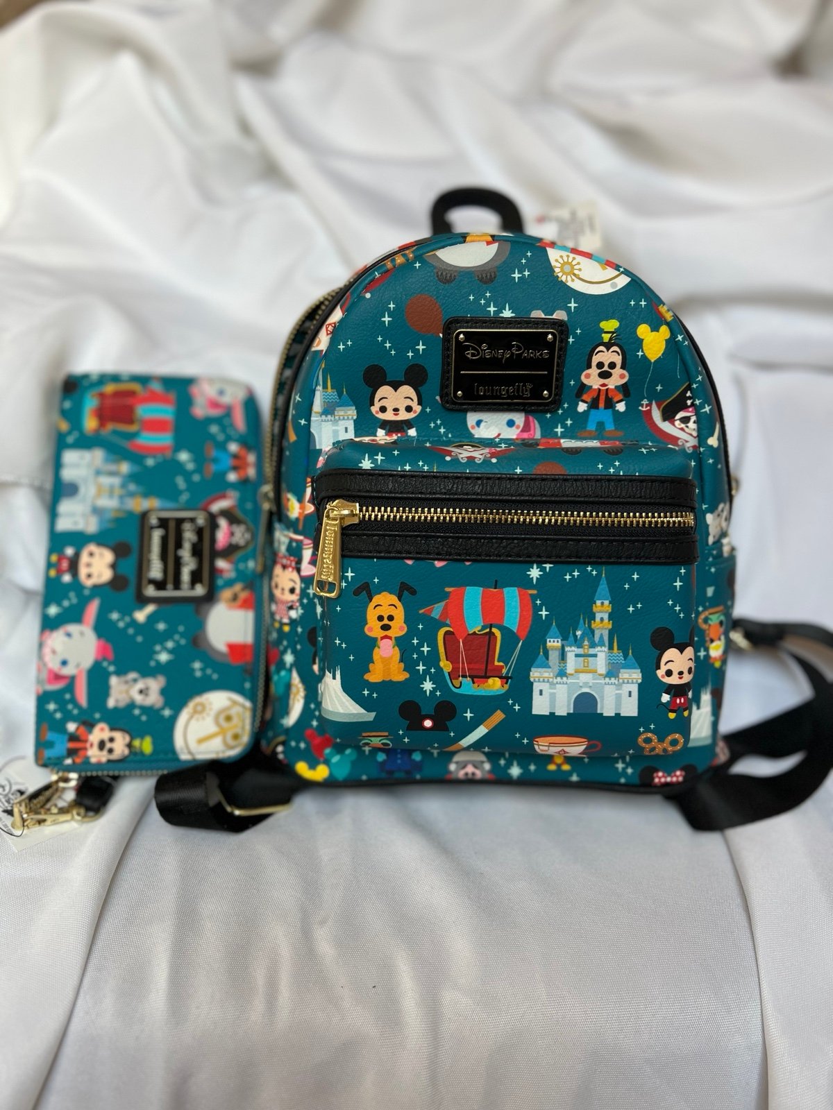 Disney attractions Loungefly mini backpack and wallet