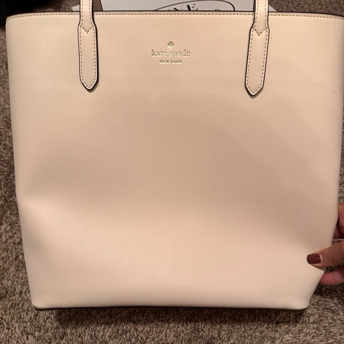 white Kate Spade purse