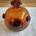 Vtg. amber art glass bottle; nodules/rigaree trim; handmade.