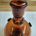 Vtg. amber art glass bottle; nodules/rigaree trim; handmade.
