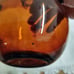 Vtg. amber art glass bottle; nodules/rigaree trim; handmade.
