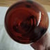 Vtg. amber art glass bottle; nodules/rigaree trim; handmade.