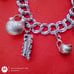 Vtg Sterling Silver Double Linked Charm Bracelet with 9 Sterling Silver Charms.