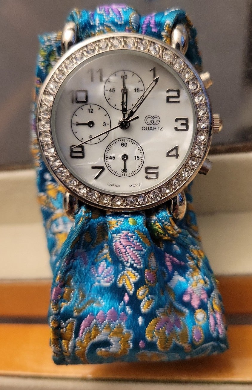 Silver Rhinestone Face Oriental Satin Bracelet Watch