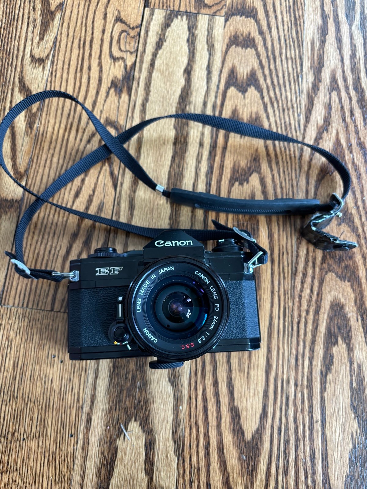 Canon EF film camera with FD 24mm lens