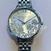 Olivia Burton All Silver Bejewelled Watch With 34mm Lace Detail Floral Face.