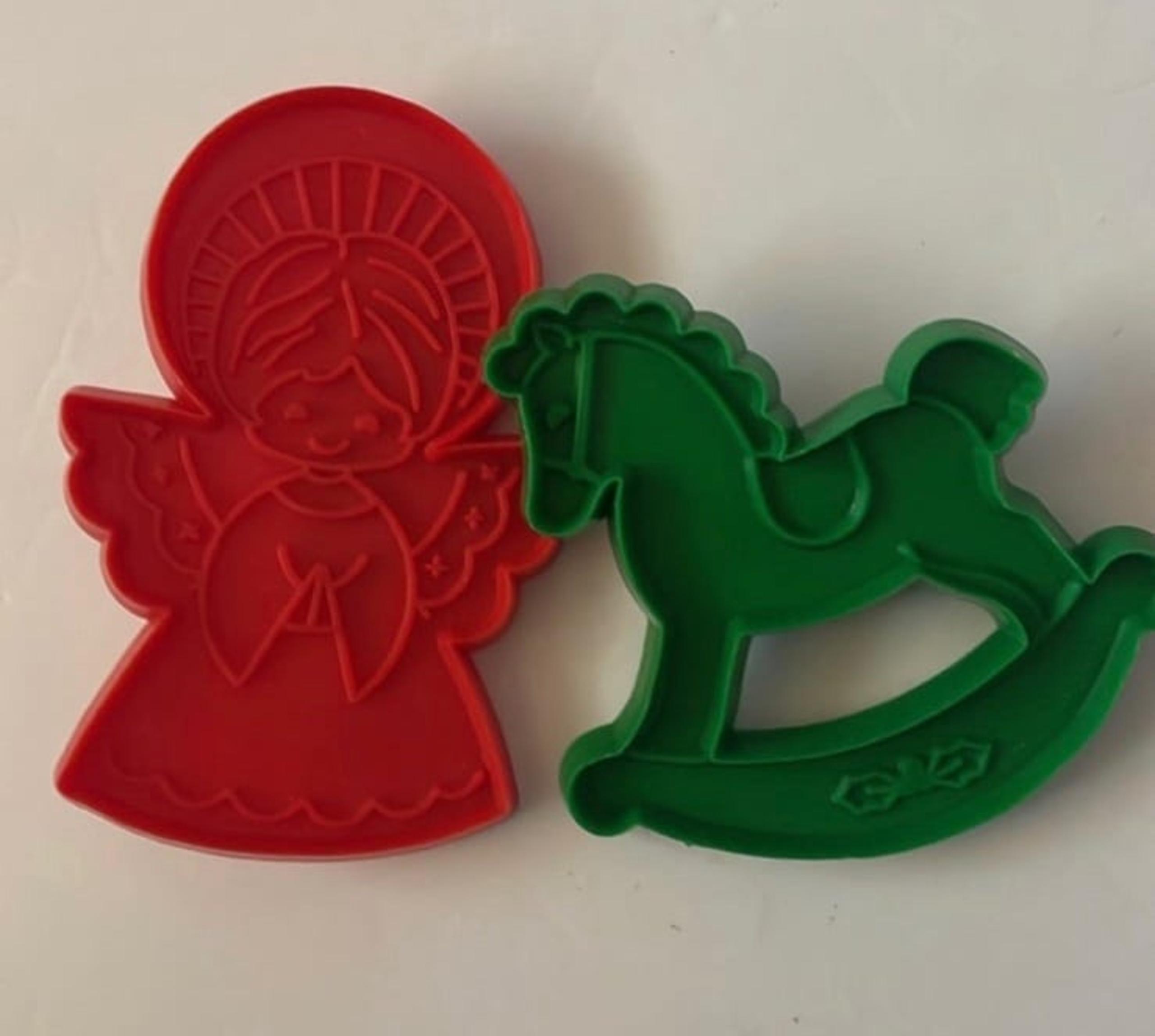 2 lot Hallmark cookie cutter Christmas angel & Rockinghorse plastic green handle
