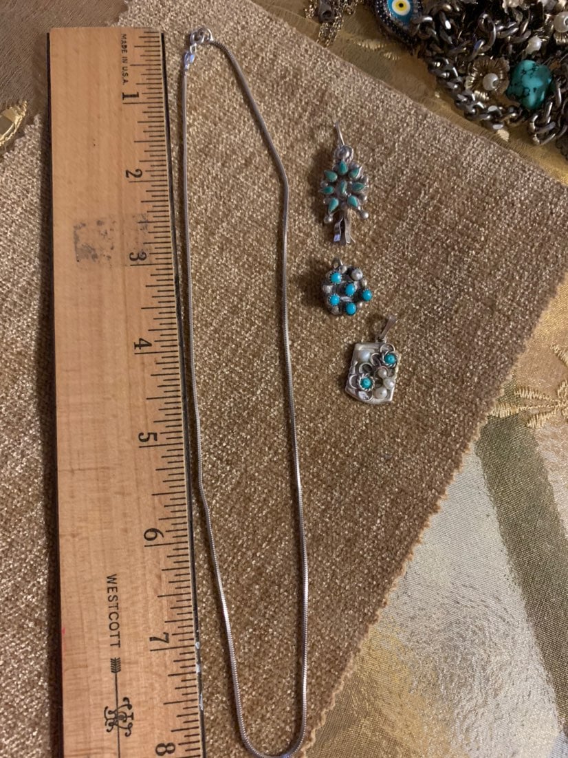 3 silver 925 pendants and one silver it