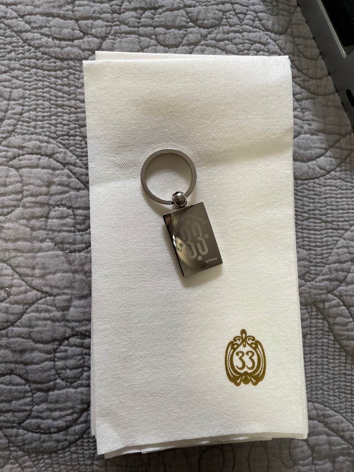 Club 33 diver keychain with 8 napkins