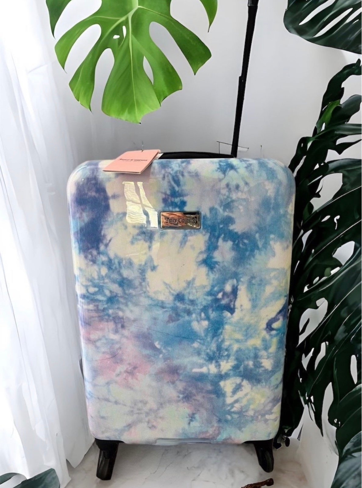 Juicy Couture 25” Spinning Hard Case Luggage