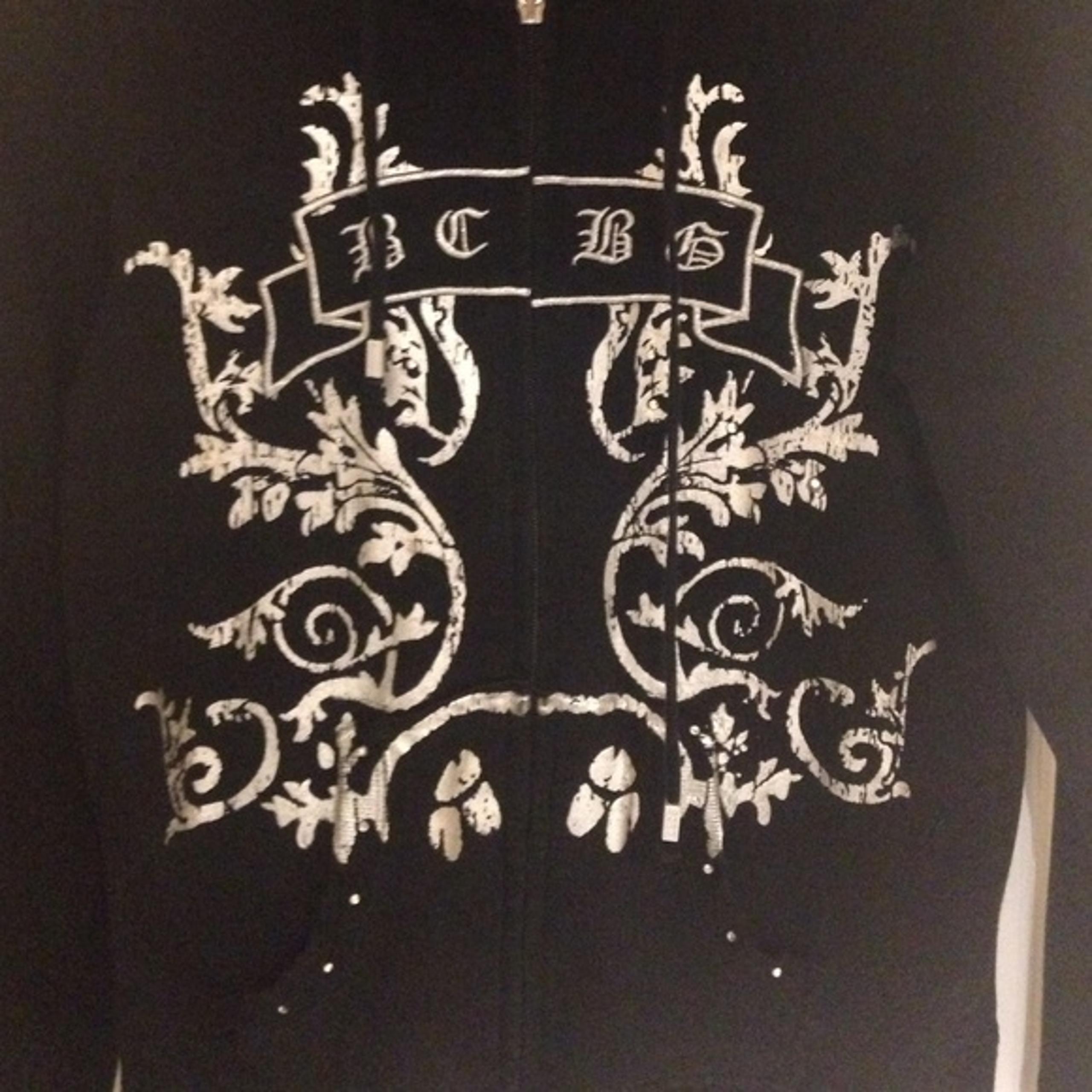 BCBG Size M zip up hoodie! Has silver details