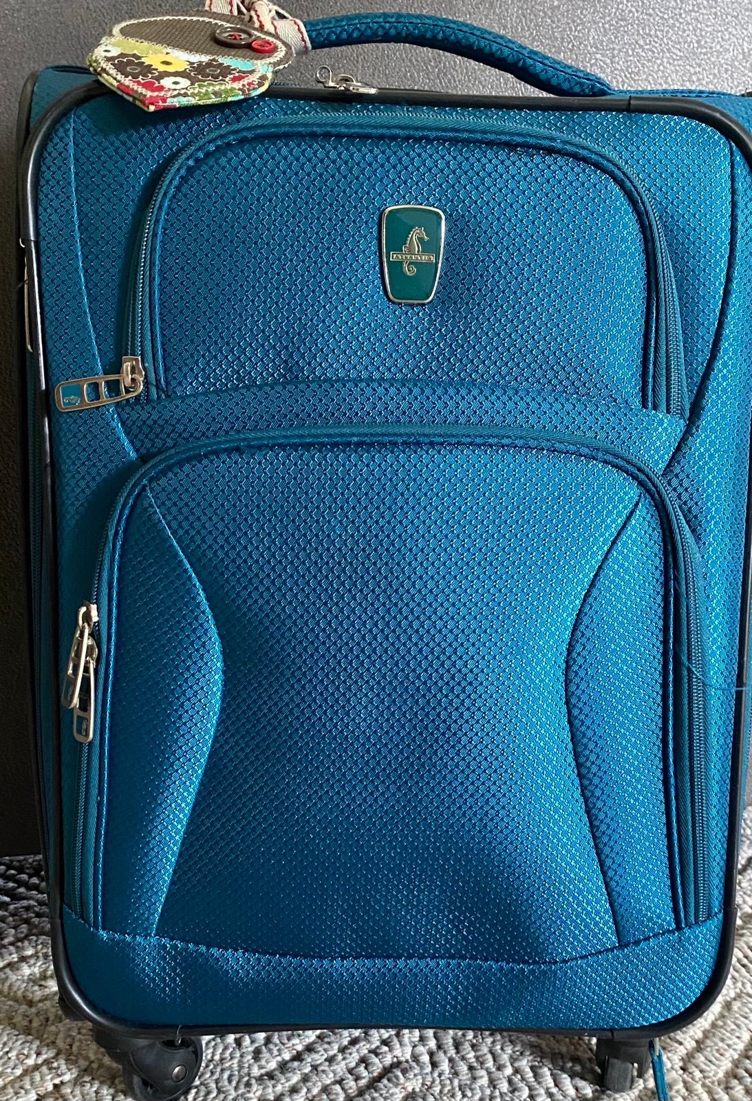 Carry- on suitcase