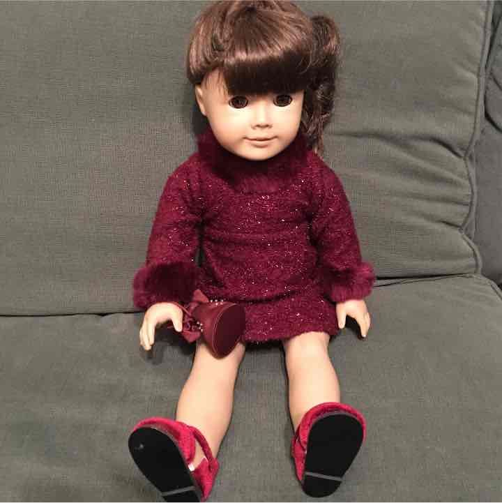 American girl doll with bag an clothing
