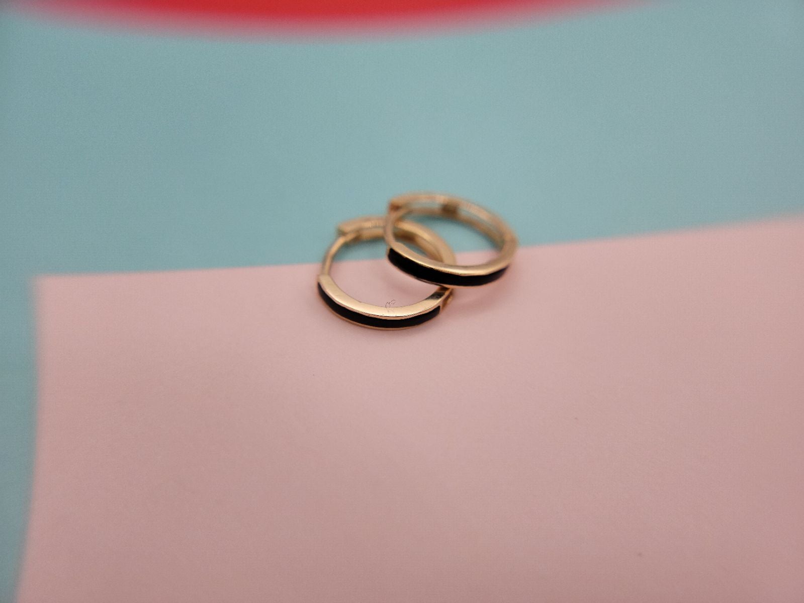 Briza 14k Gold onyx huggie hoop earrings