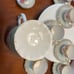 Chocolate or tea pot with cups and saucers