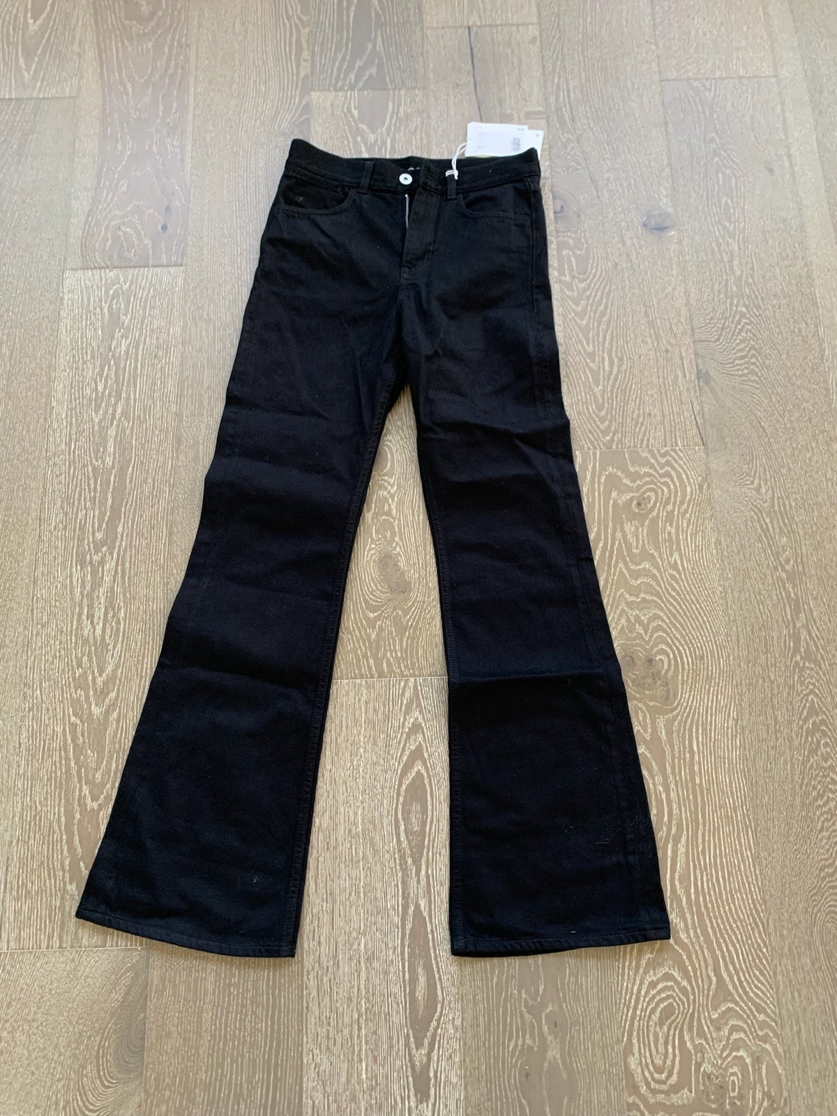 COS Relaxed flare jeans in black