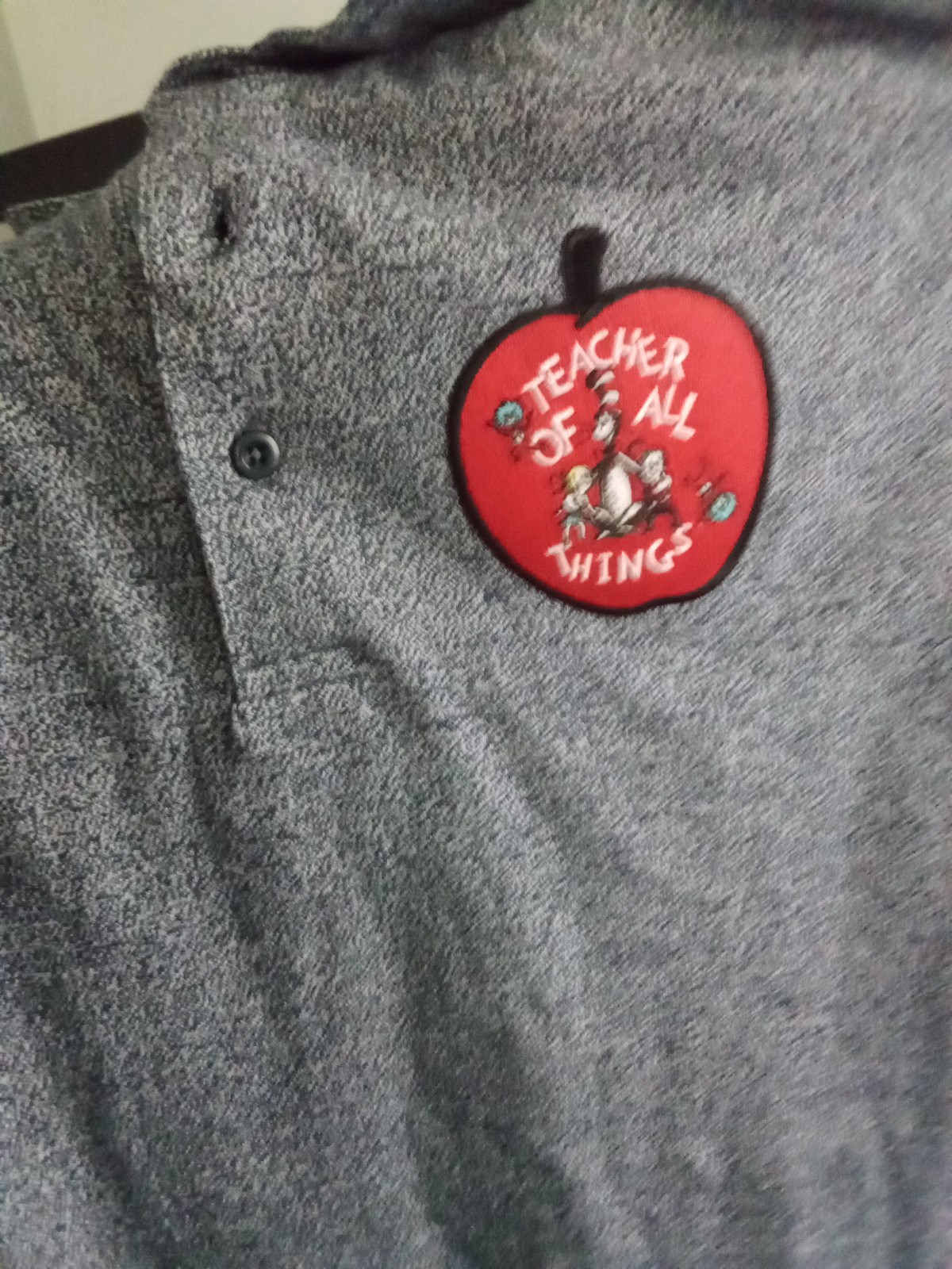 New Universal Studios Dr. Seuss Teacher of All Things Polo Shirt