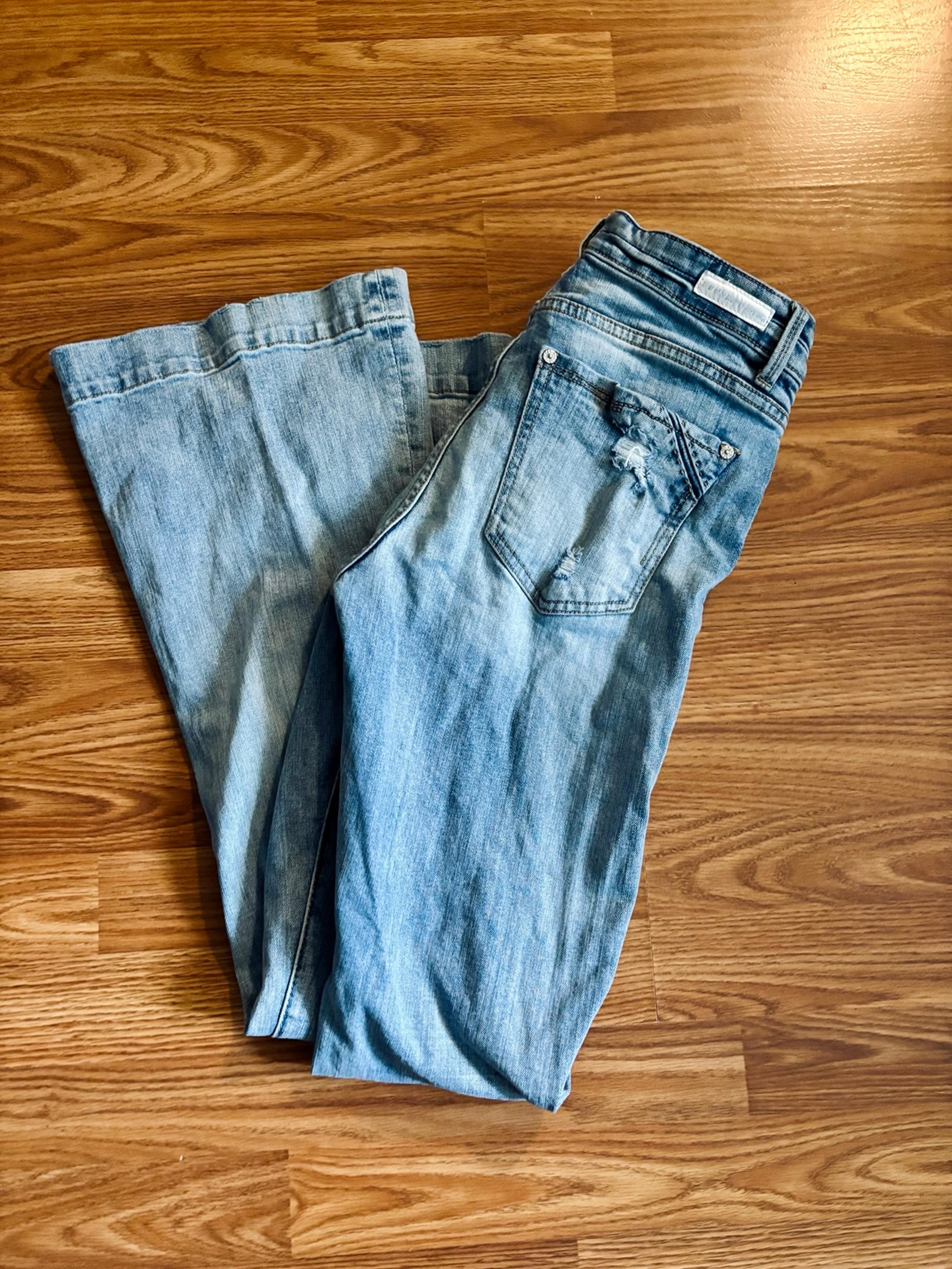 The Buckle Flare Trouser Jeans