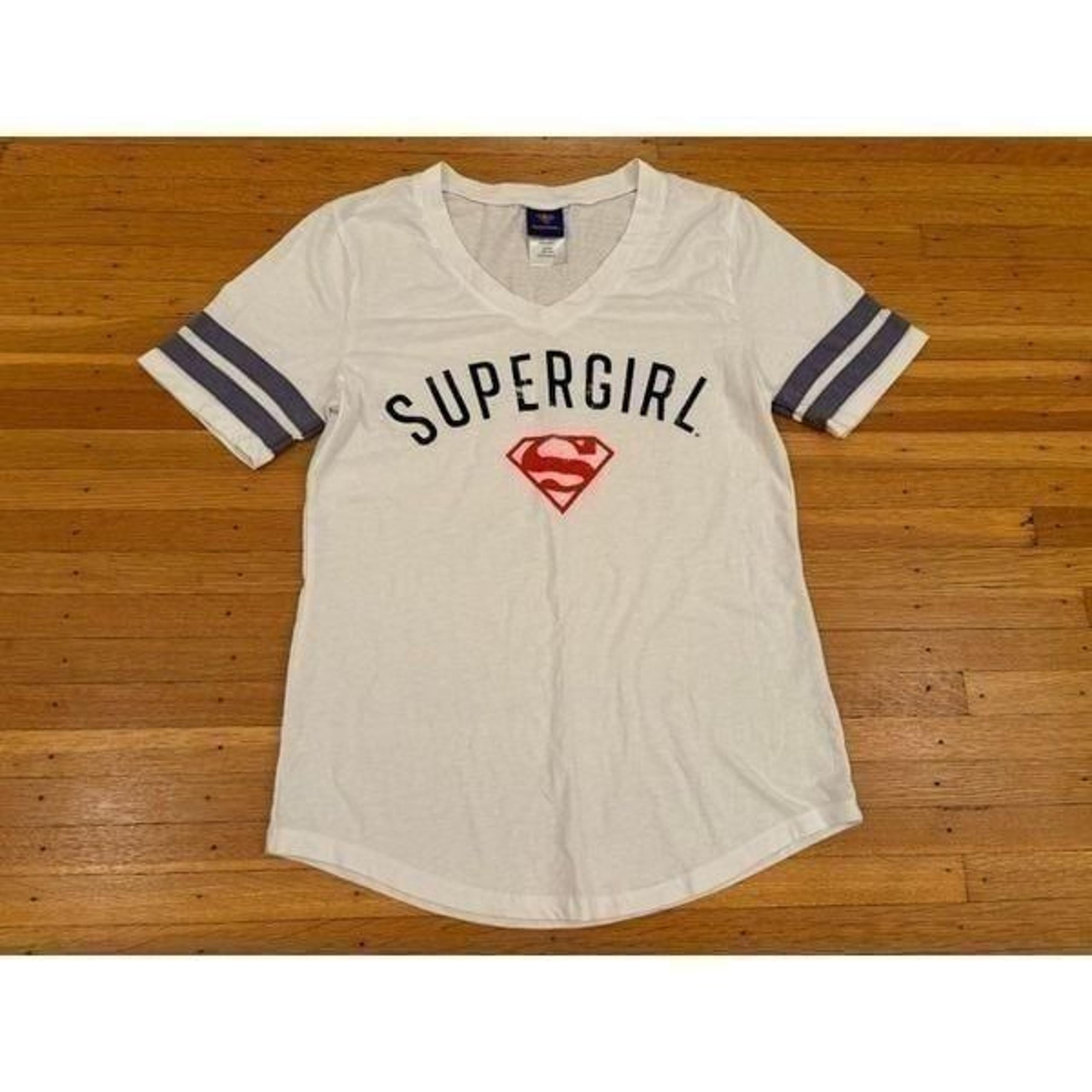 Superman Supergirl white lightweight short sleeve tee shirt.
