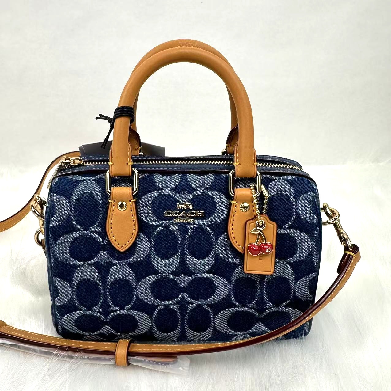 Coach Mini Rowan Crossbody Bag In Signature Denim In Den Gold/Natural CY742
