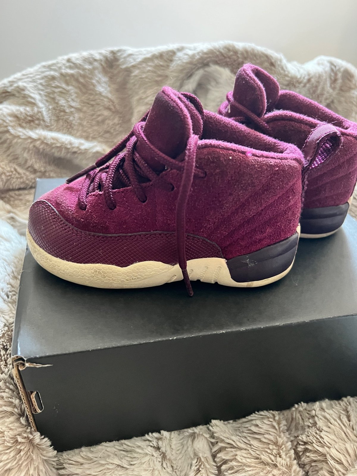 2 Jordan 12’s 7c