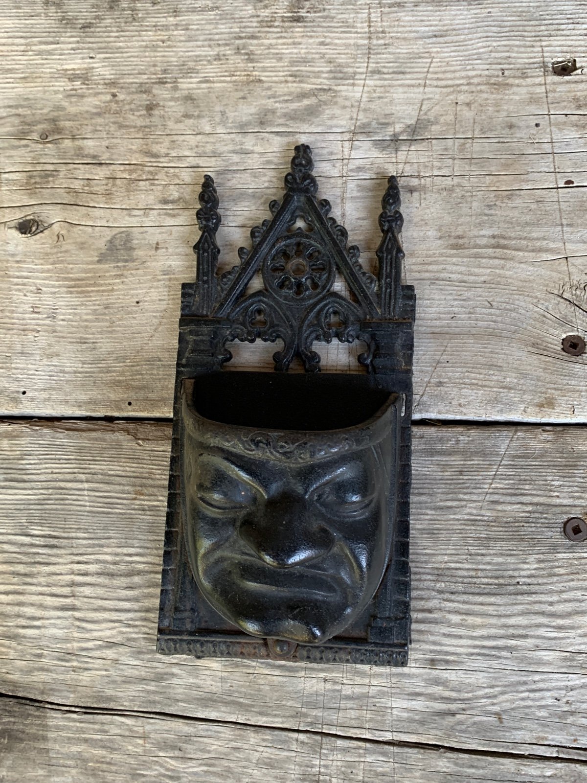 Grumpy Face Cast Iron Match Holder