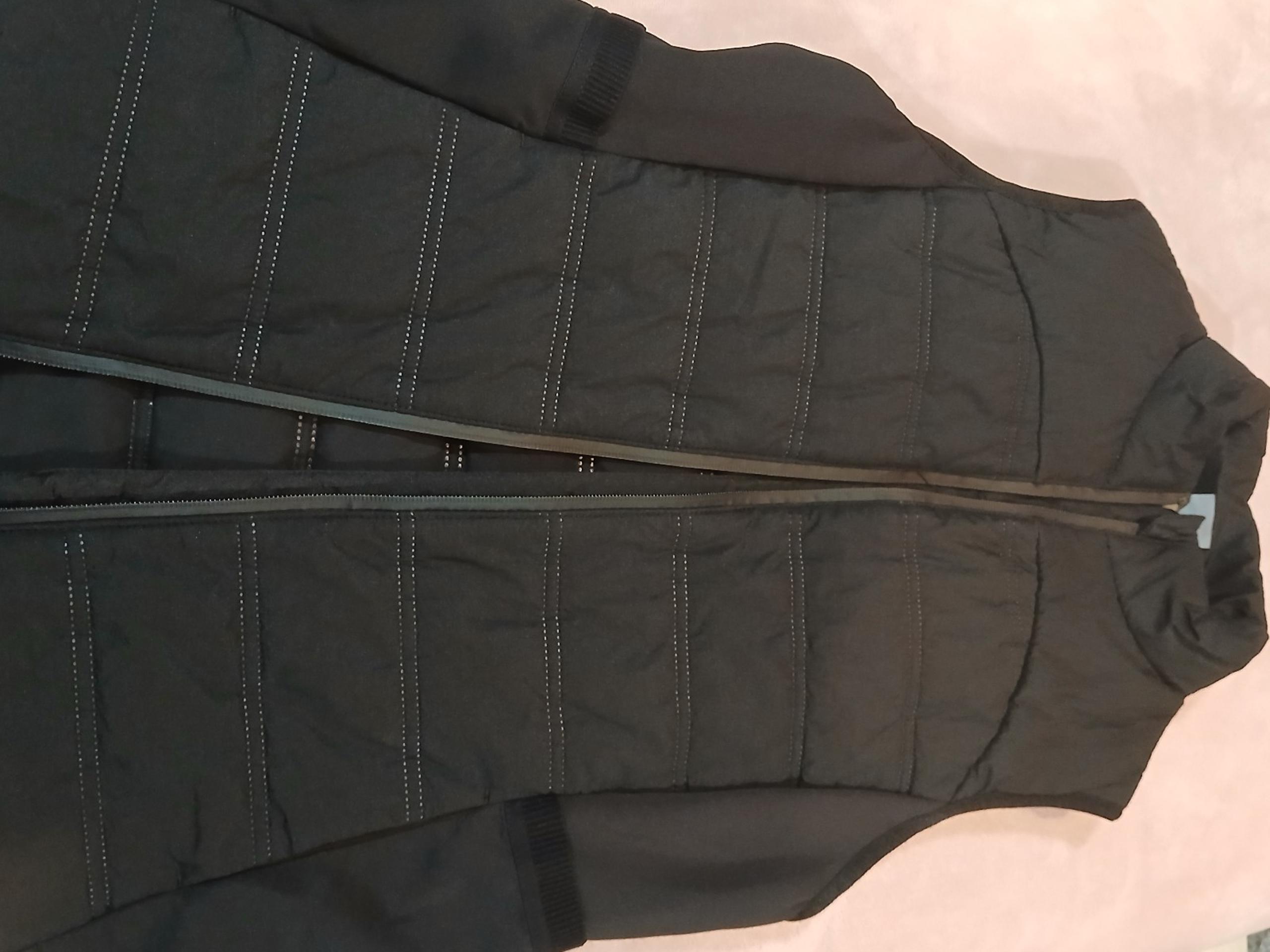 Womens black vest.